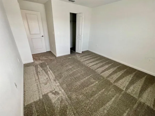 an empty room with a natural light