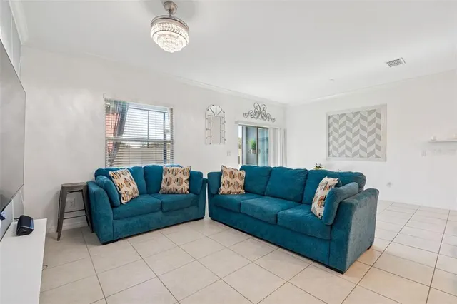 a bedroom with a bed and a desk