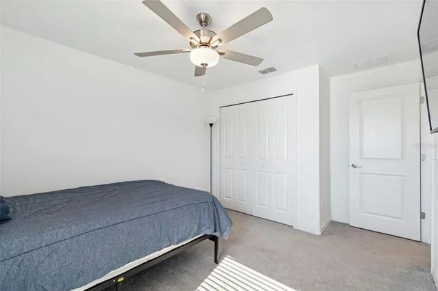 an aerial view of a house with swimming pool