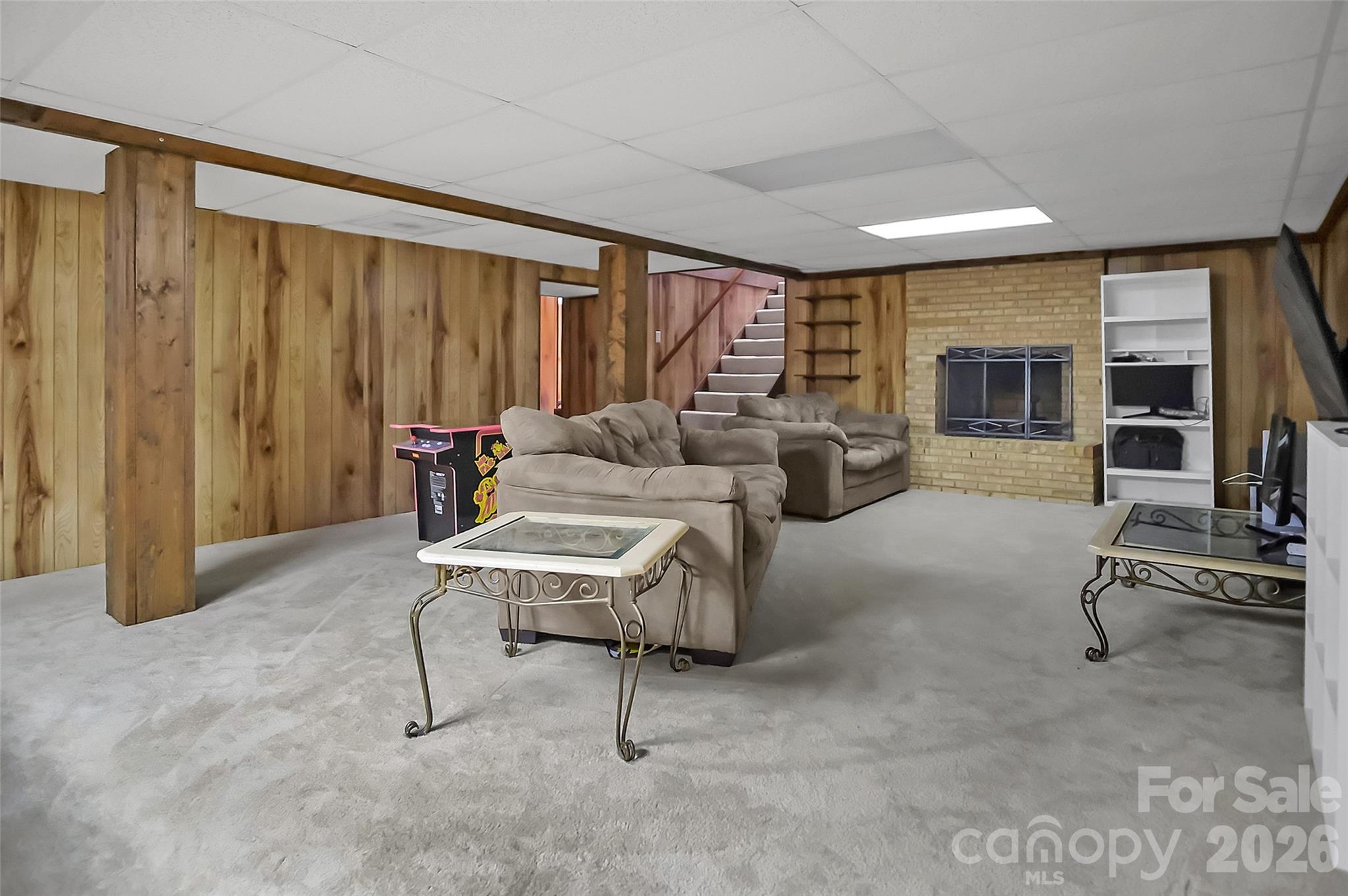 808 Old Mt Holly Road Stanley, NC 28164 - Photo 42 of 48 a living room with furniture and a fireplace