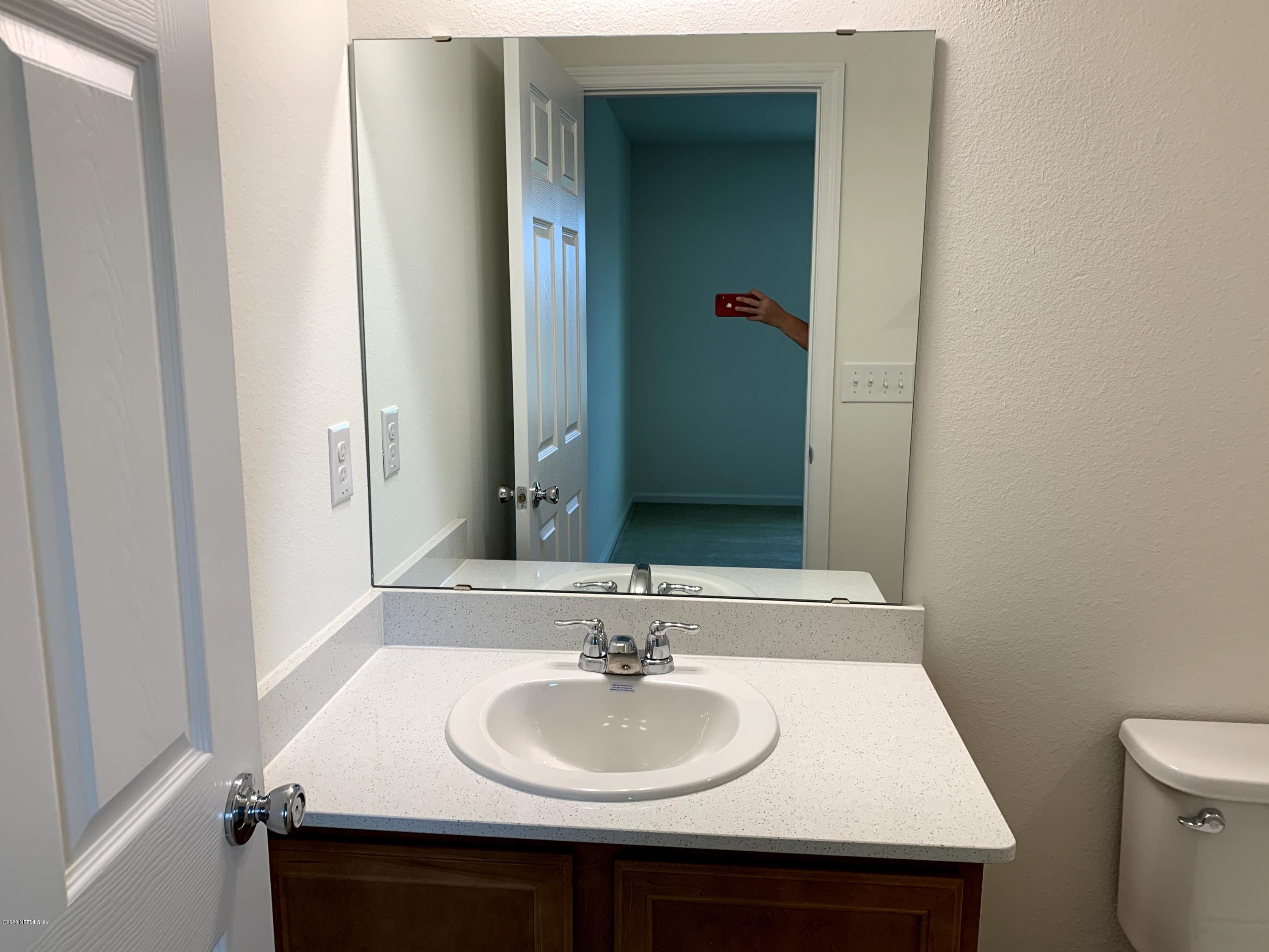 57 Bella Vita Way Ormond Beach, FL 32174 - Photo 13 of 16 a bathroom with a sink and a toilet