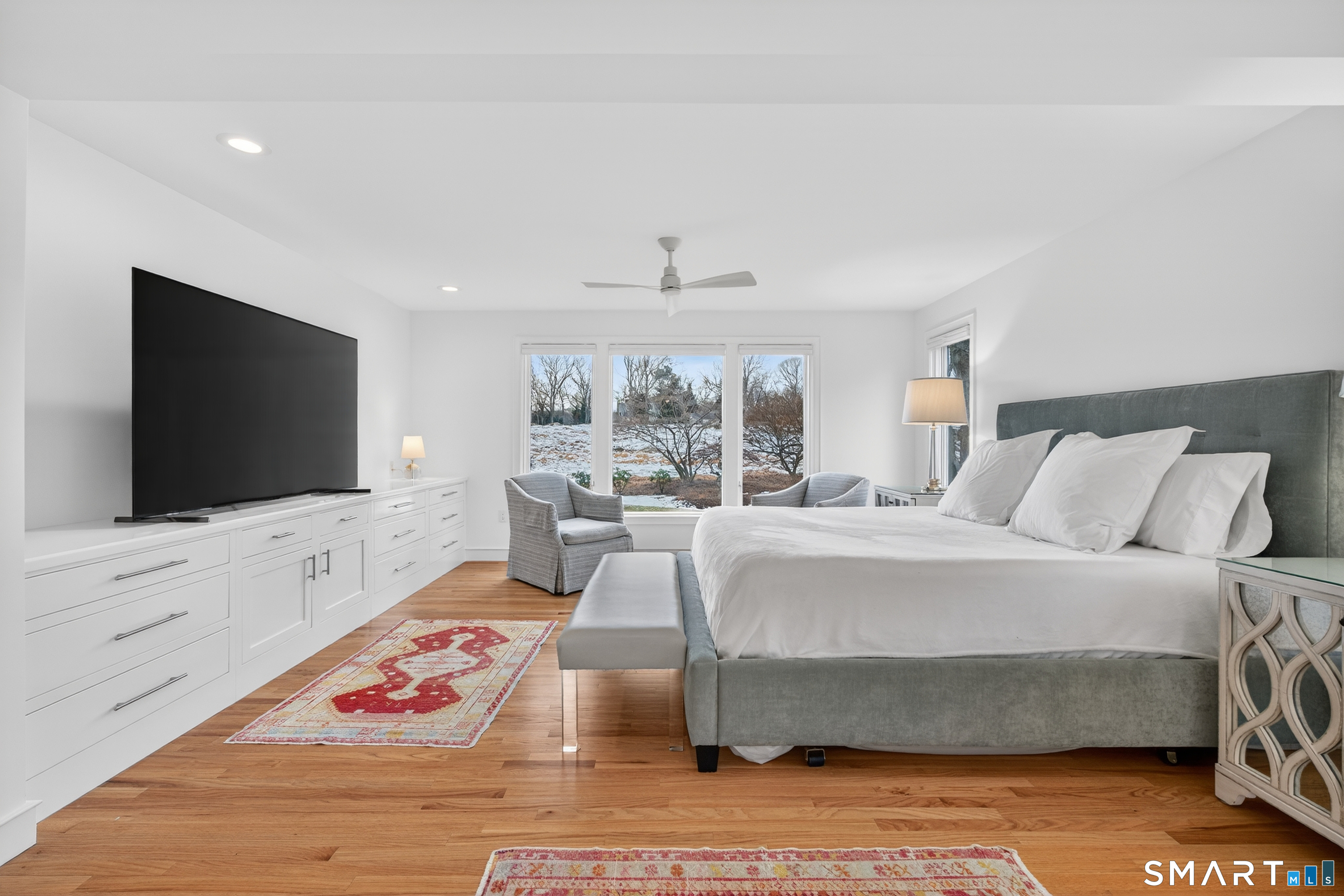 83 Old North Road Mystic, CT 06355 - Photo 14 of 40 a living room with furniture and a flat screen tv