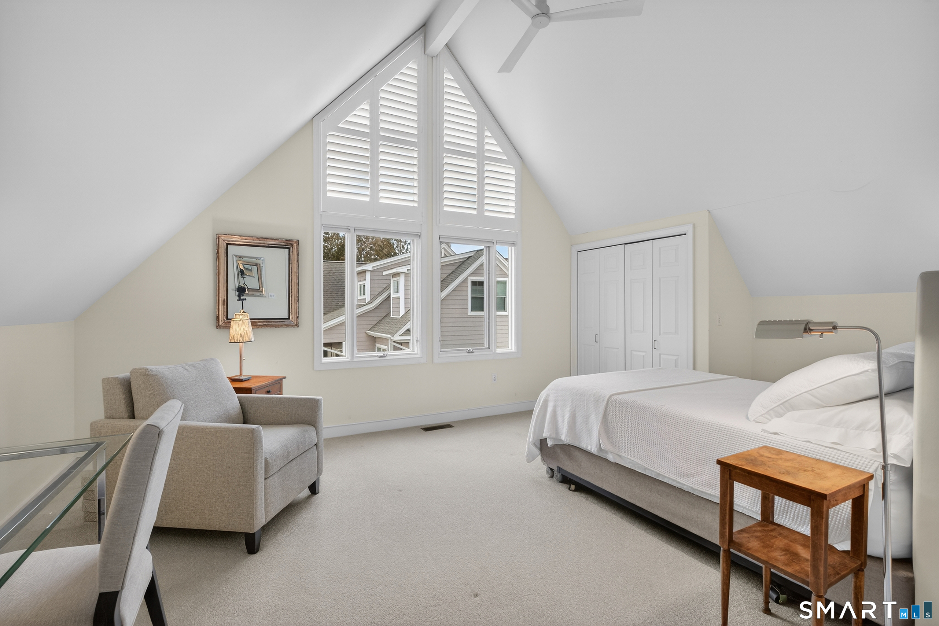 83 Old North Road Mystic, CT 06355 - Photo 20 of 40 a bedroom with a bed and wooden floor