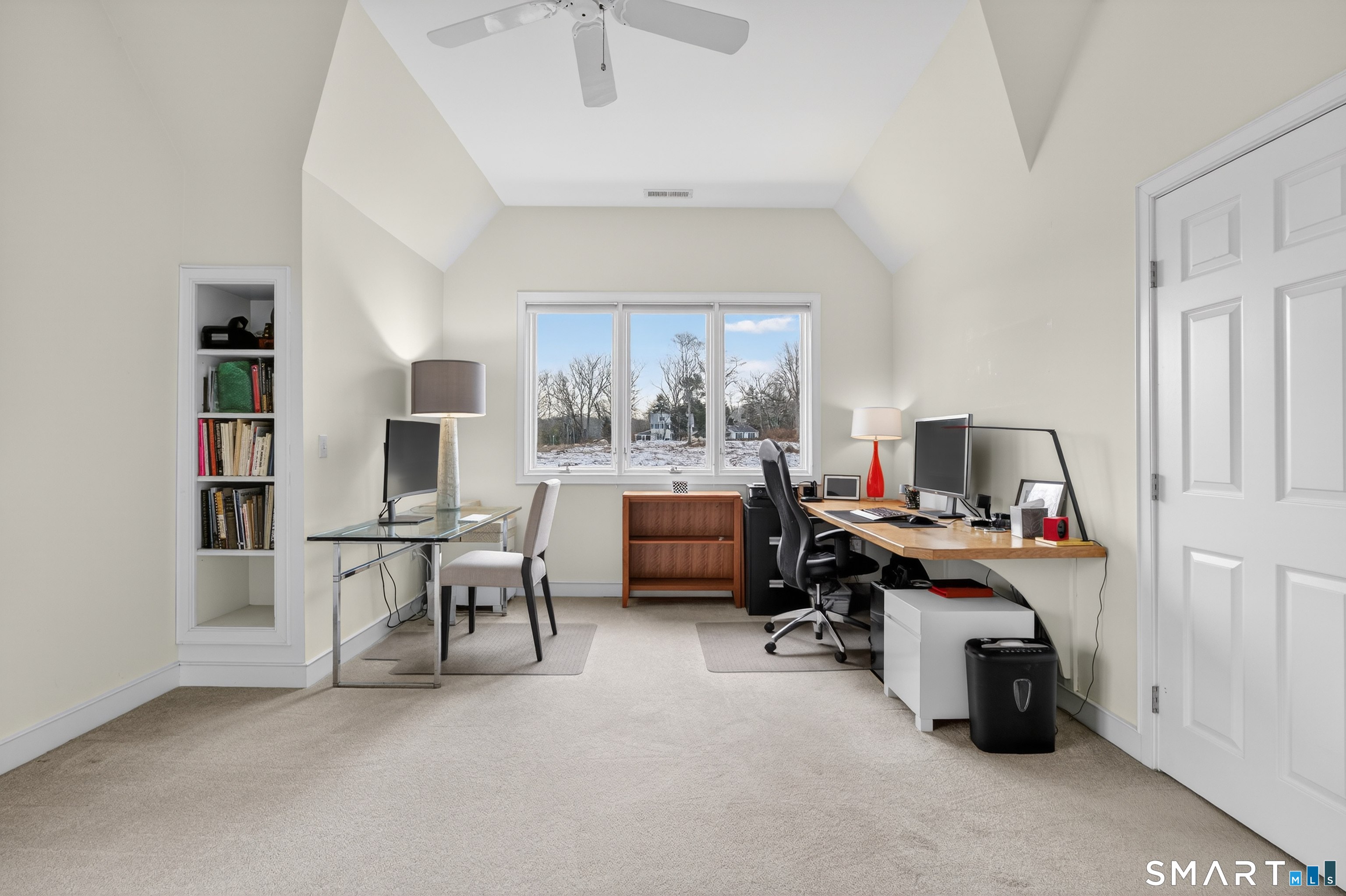 83 Old North Road Mystic, CT 06355 - Photo 28 of 40 a workspace with furniture and a chandelier