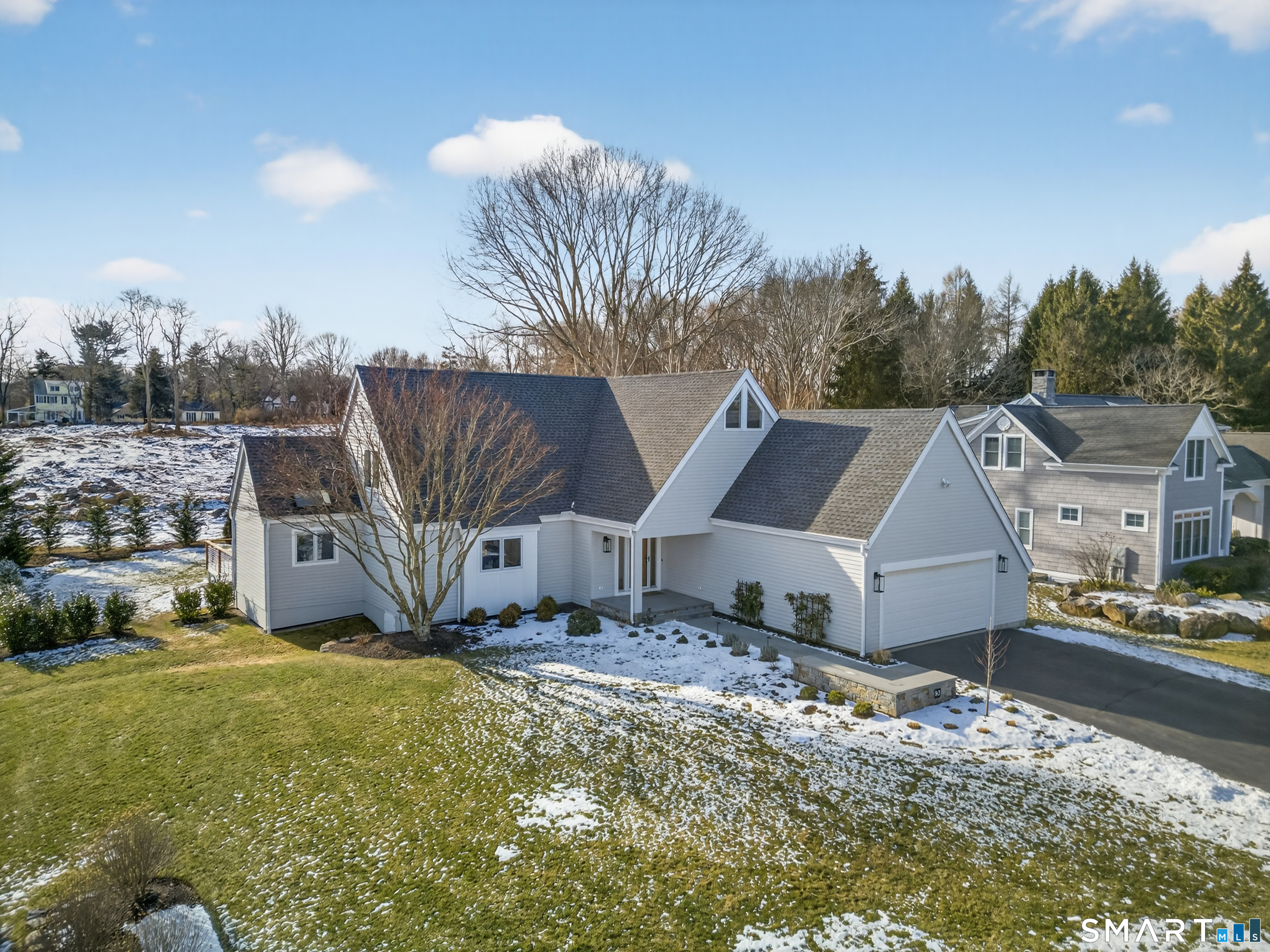 83 Old North Road Mystic, CT 06355 - Photo 30 of 40 a view of a house with a big yard and large trees