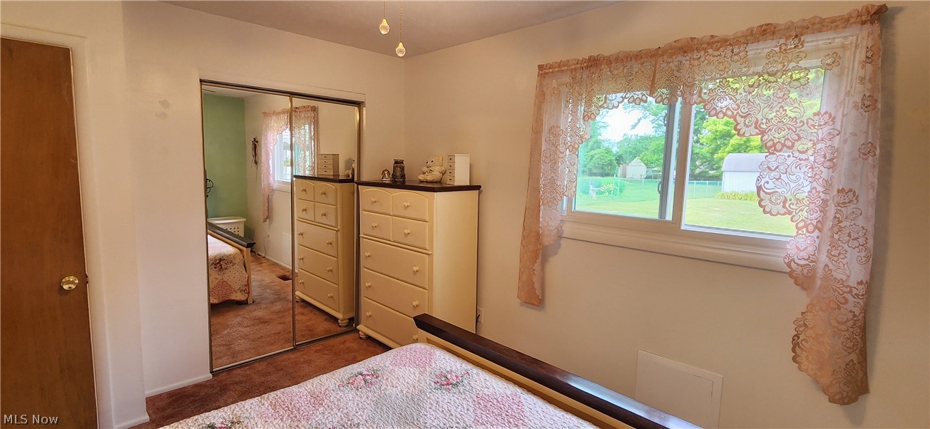 5852 Lake Road Mentor, OH 44060 - Photo 16 of 45 Carpeted bedroom featuring a closet