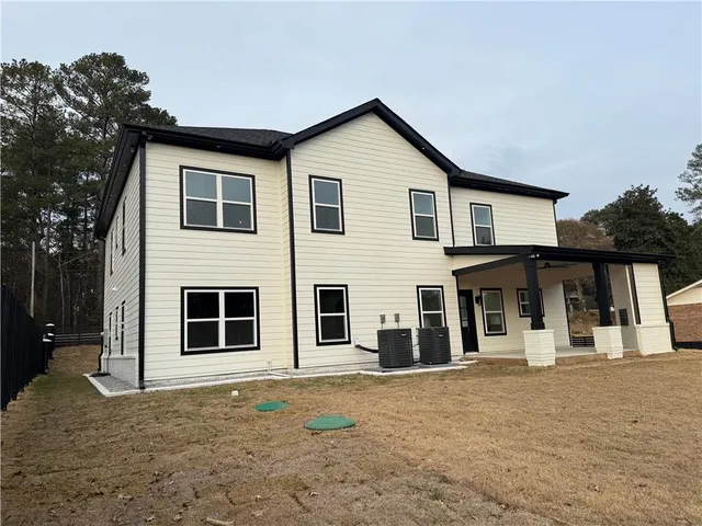 a house view with a garden space