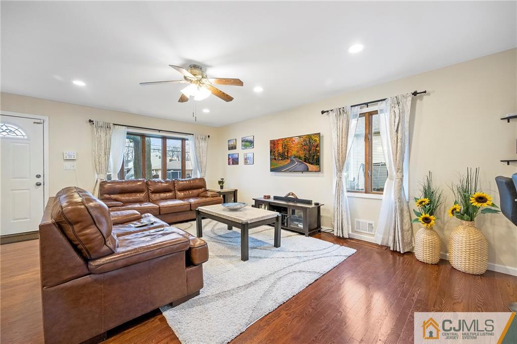 41 Ferris Road Edison, NJ 08817 - Photo 5 of 33 a living room with furniture and wooden floor