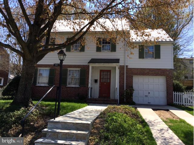 511 Yarmouth Road Baltimore, MD 21286 - Photo 1 of 1 a front view of a house with a yard and garage