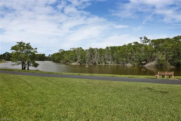 a view of a lake and a yard