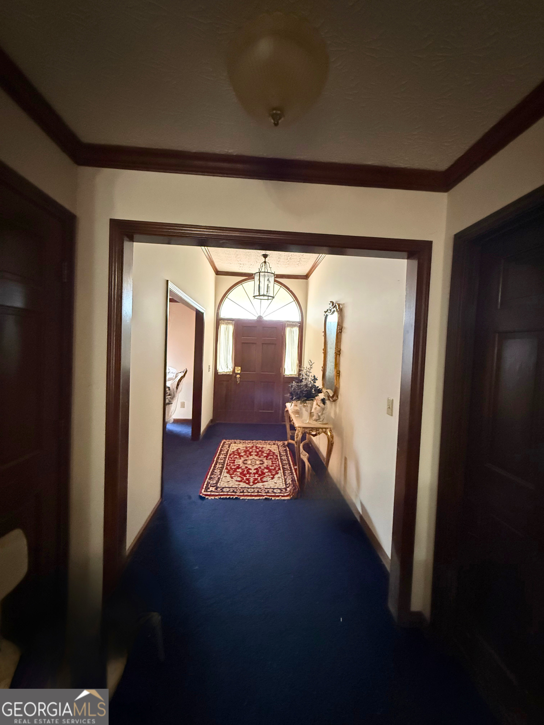 8872 Conners Road Villa Rica, GA 30180 - Photo 7 of 20 a view of a hallway with wooden floor and windows