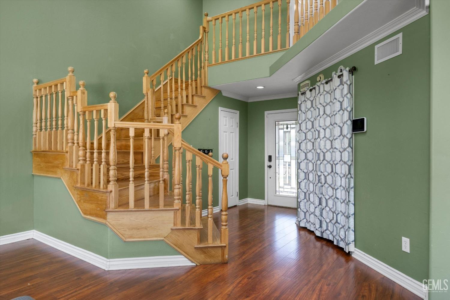 Undisclosed Address Bakersfield, CA 93313 - Photo 15 of 48 a view of entryway with wooden floor