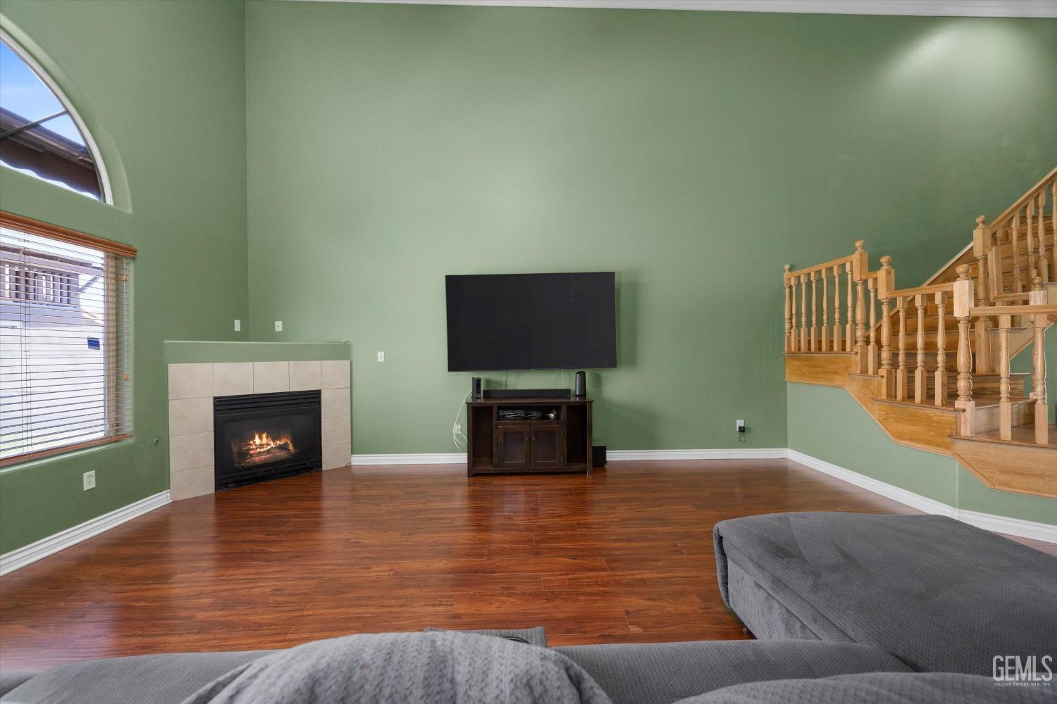 Undisclosed Address Bakersfield, CA 93313 - Photo 17 of 48 a living room with furniture and a fireplace