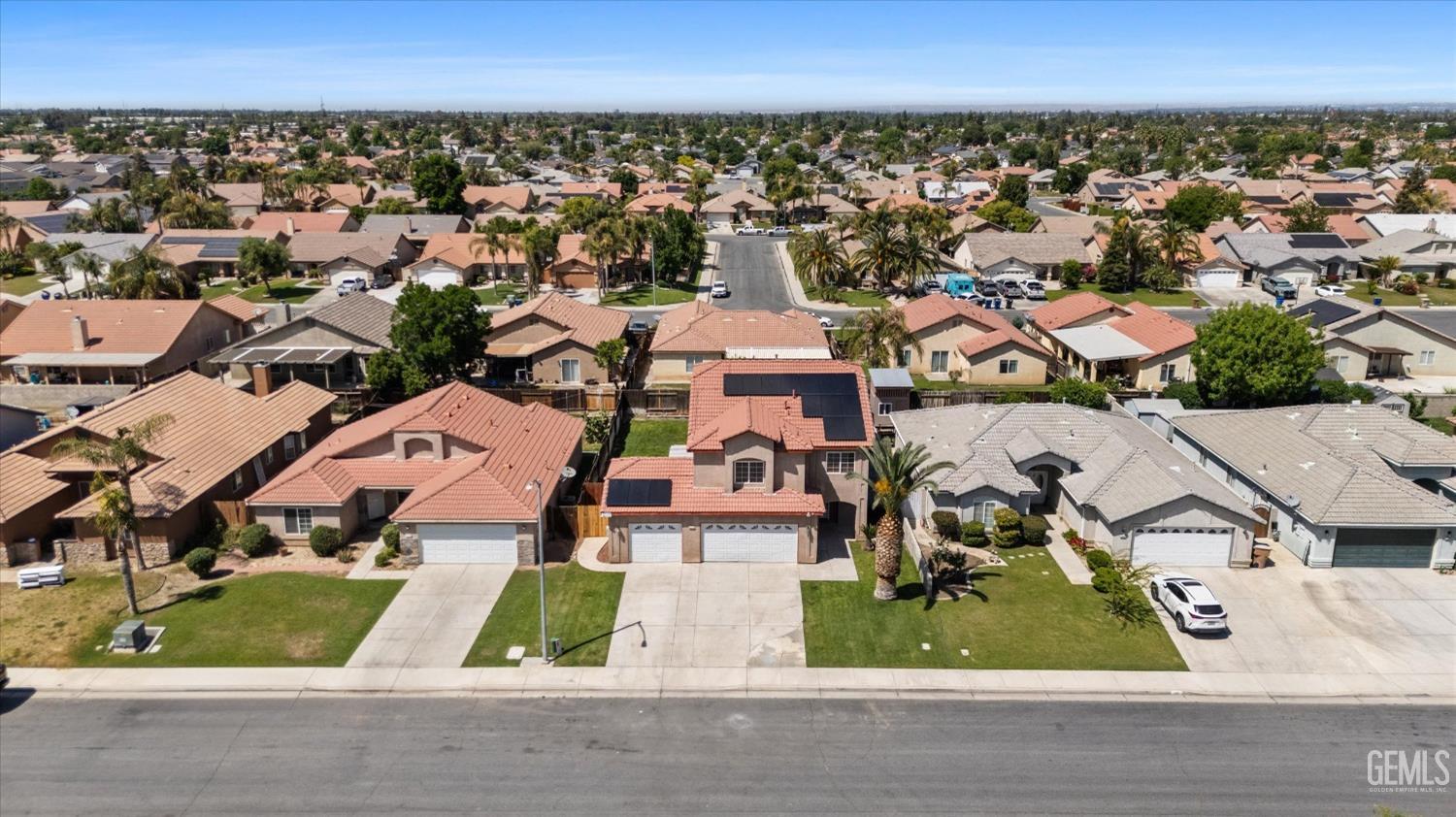Undisclosed Address Bakersfield, CA 93313 - Photo 5 of 48 an aerial view of residential houses with outdoor space