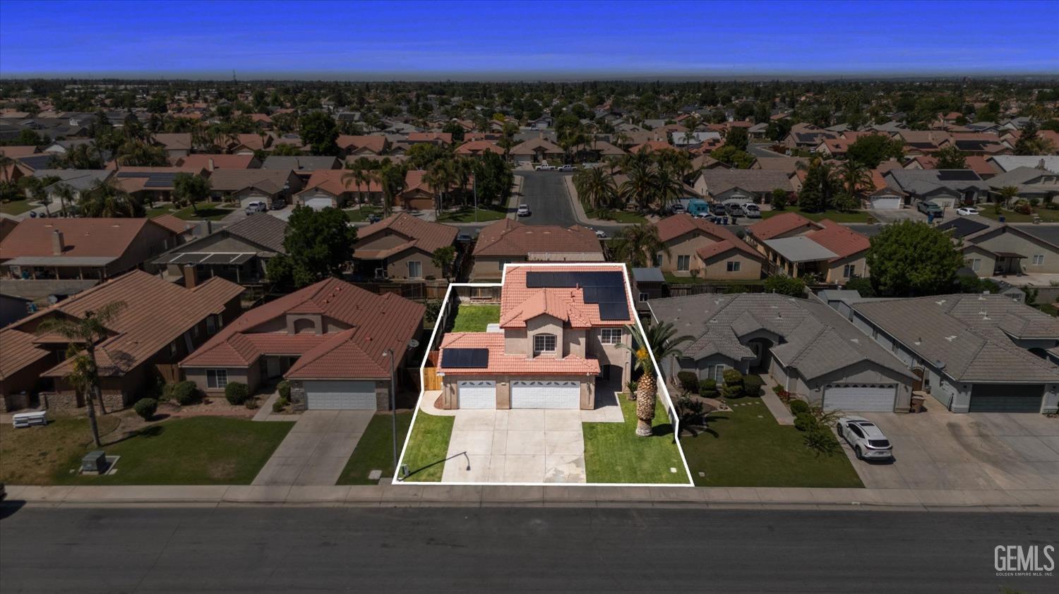 Undisclosed Address Bakersfield, CA 93313 - Photo 6 of 48 an aerial view of residential houses with outdoor space and street view