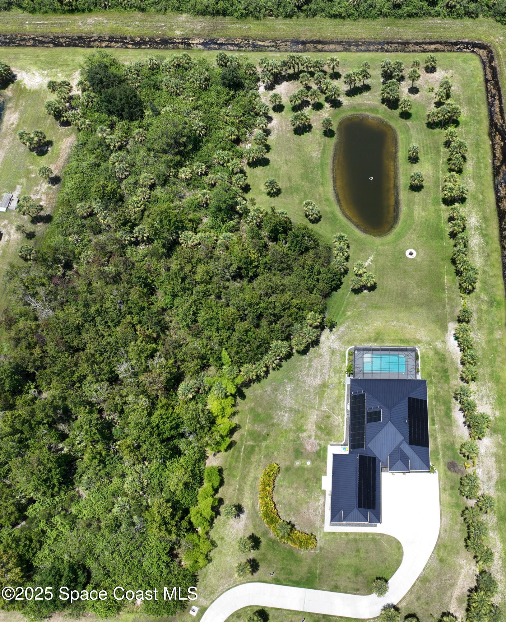 300 Pinto Lane Palm Bay, FL 32909 - Photo 54 of 70 300 Pinto aerial with pool