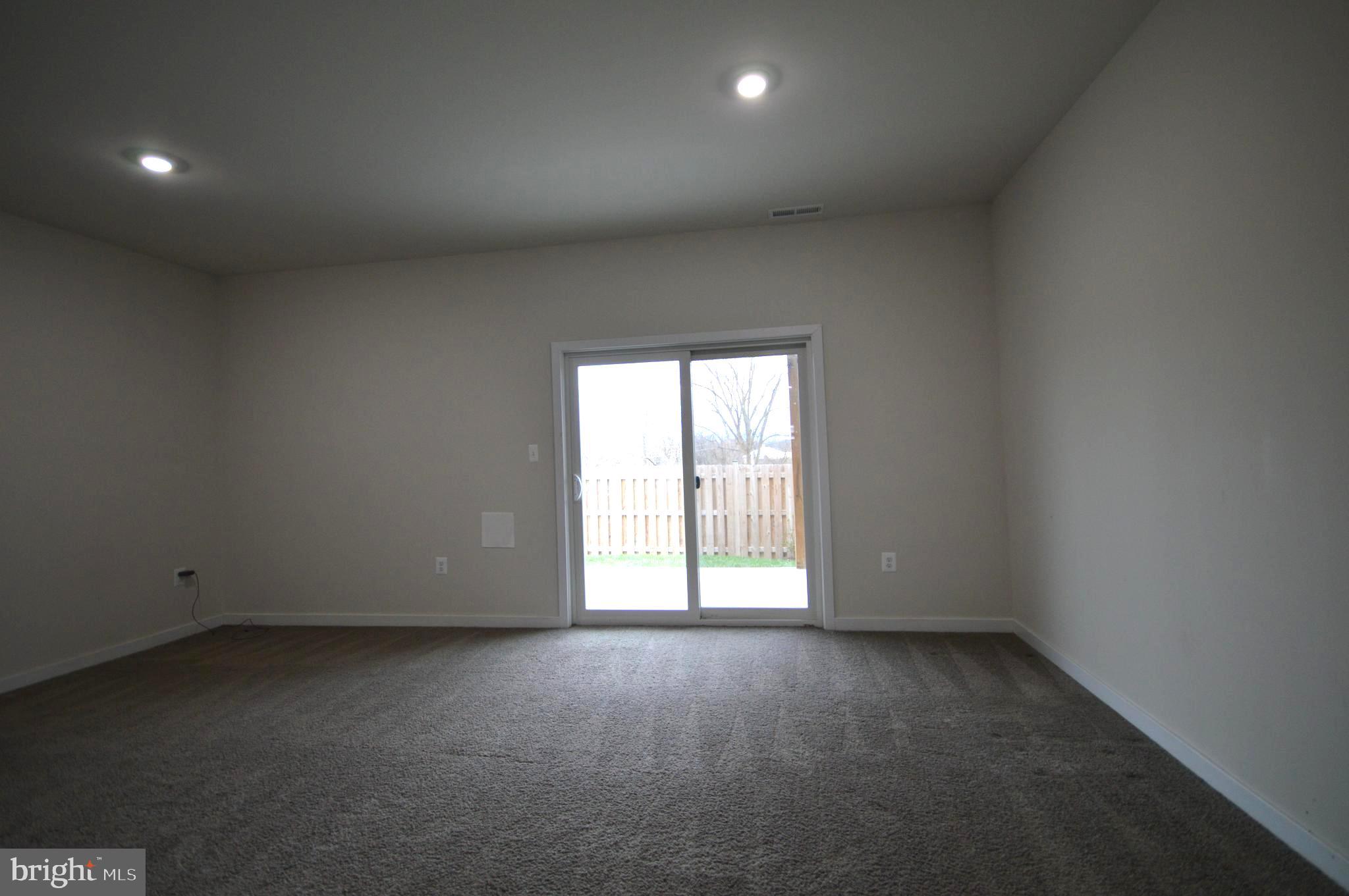 44 Marineris Circle Martinsburg, WV 25405 - Photo 17 of 19 an empty room with a window