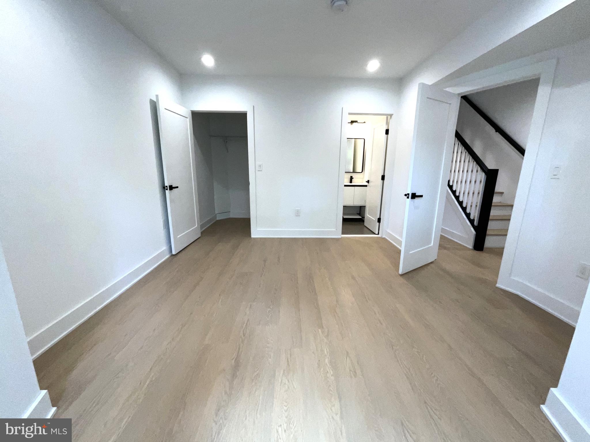 1211 Rhode Island Avenue Northwest, Unit 1 Washington, DC 20005 - Photo 14 of 24 a view of empty room with wooden floor