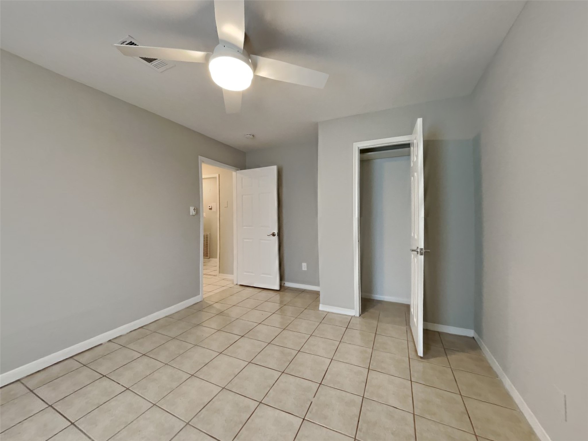 10648 Fussel Road, Unit A Conroe, TX 77385 - Photo 12 of 18 a view of an empty room and window