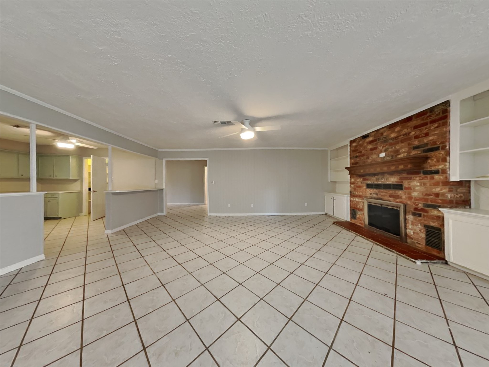 10648 Fussel Road, Unit A Conroe, TX 77385 - Photo 3 of 18 a view of empty room with wooden floor