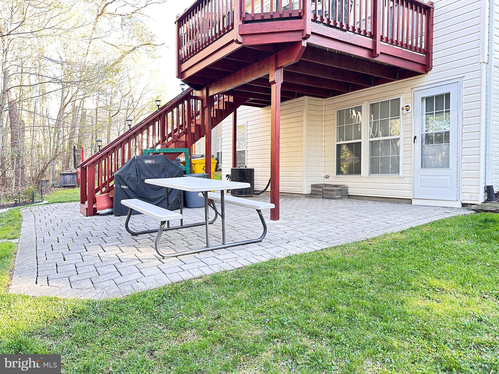 3206 Shadow Park Drive Laurel, MD 20724 - Photo 26 of 28 an outdoor sitting area with couch and wooden roof