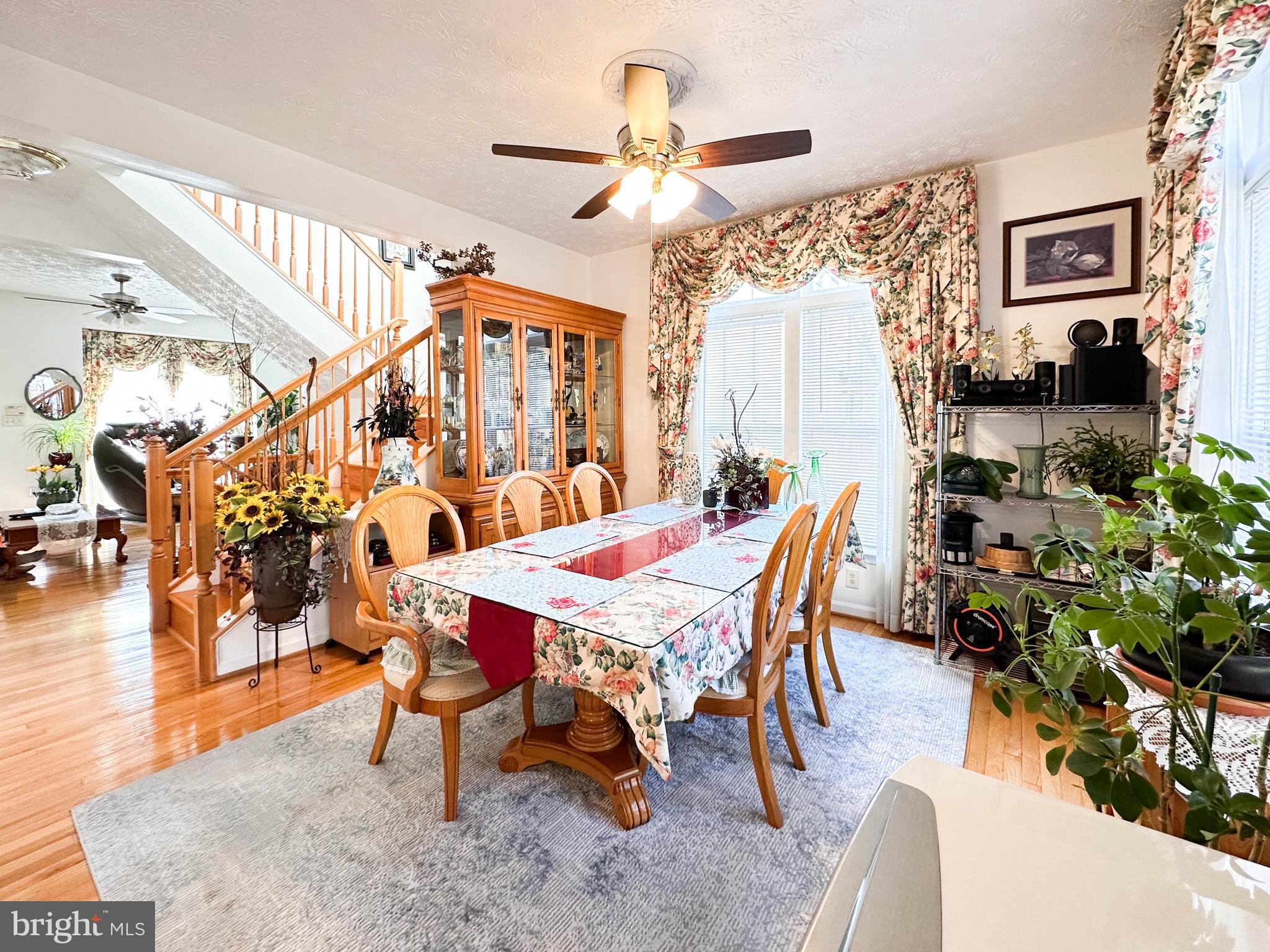 3206 Shadow Park Drive Laurel, MD 20724 - Photo 3 of 28 a dining room with furniture and wooden floor