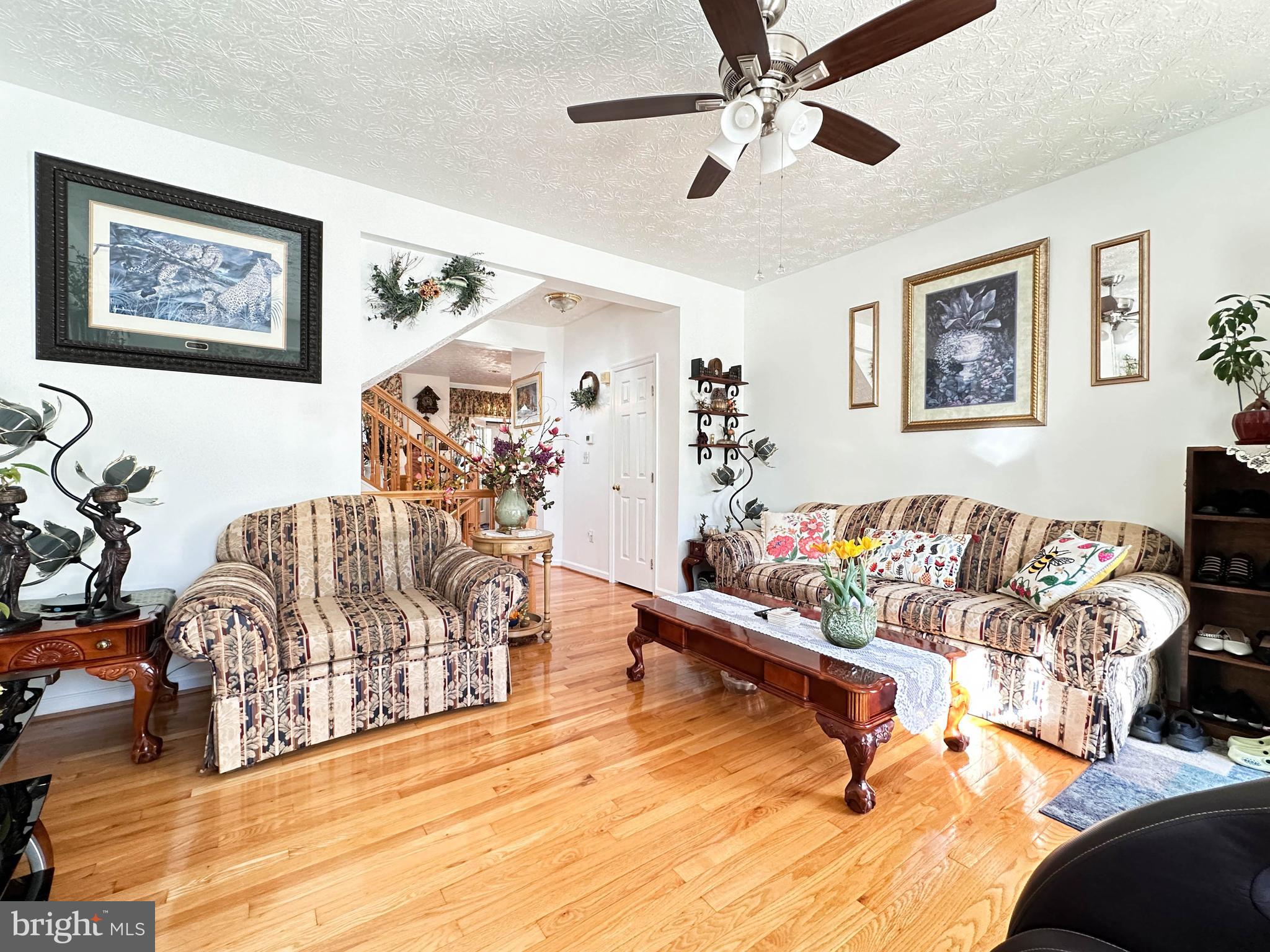 3206 Shadow Park Drive Laurel, MD 20724 - Photo 4 of 28 a living room with furniture and a wooden floor