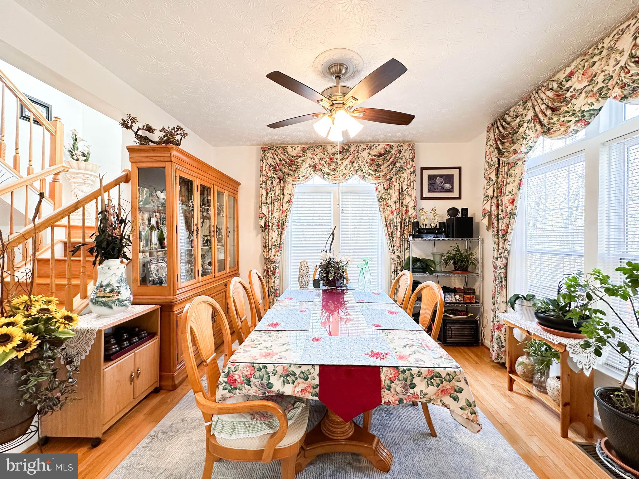 3206 Shadow Park Drive Laurel, MD 20724 - Photo 7 of 28 a view of a dining room with furniture window and wooden floor