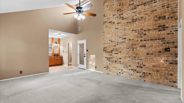 a bathroom with a double vanity sink and mirror