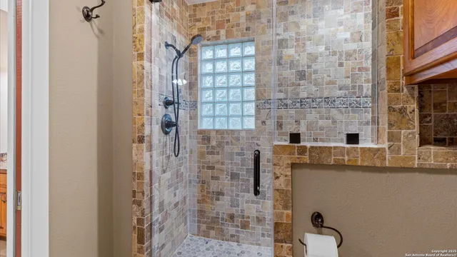 a view of a kitchen counter top of a sink