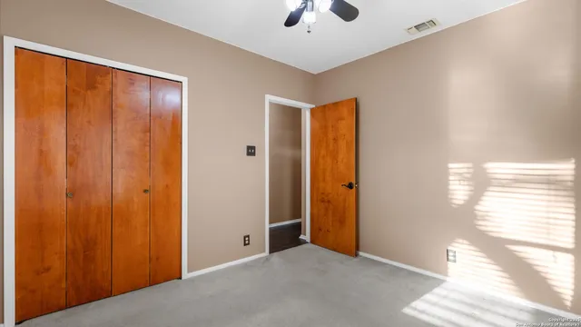 a view of a patio with a backyard