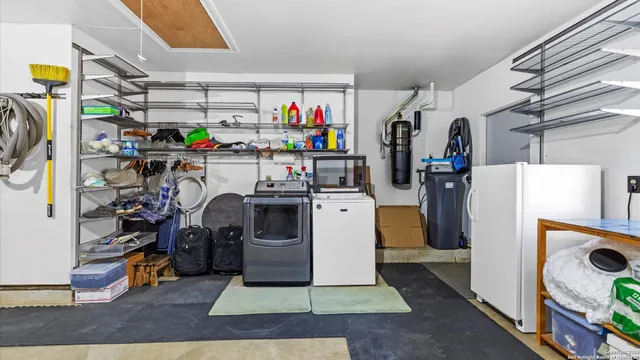 an aerial view of house with yard