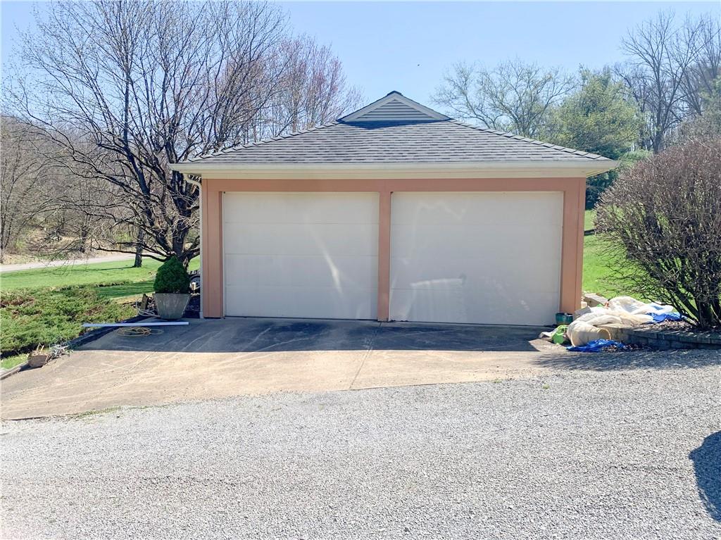 153 State Rte 1035 Kittanning, PA 16201 - Photo 12 of 14 a front view of house with yard and trees in the background