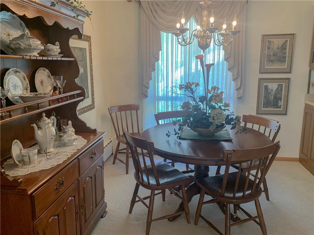 153 State Rte 1035 Kittanning, PA 16201 - Photo 4 of 14 a view of a dining room with furniture and chandelier
