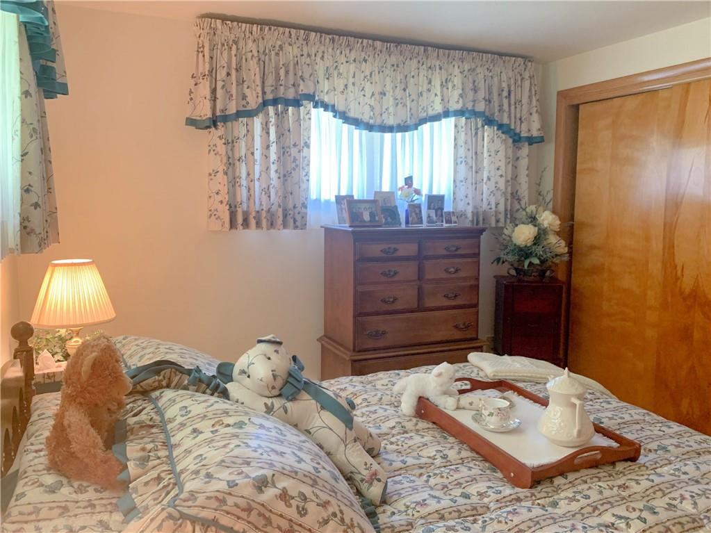 153 State Rte 1035 Kittanning, PA 16201 - Photo 9 of 14 a bedroom with a bed and a dresser
