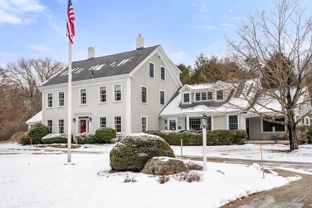 440 Conant Road Weston, MA 02493 - Photo 1 of 15 a front view of a house with a yard