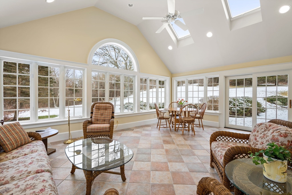 440 Conant Road Weston, MA 02493 - Photo 11 of 15 a living room with furniture and a large window