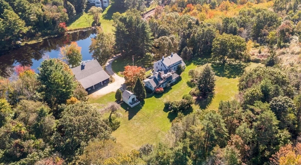 440 Conant Road Weston, MA 02493 - Photo 13 of 15 an aerial view of residential houses with outdoor space