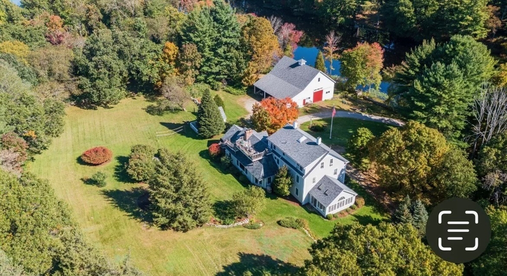 440 Conant Road Weston, MA 02493 - Photo 14 of 15 an aerial view of a house with a yard