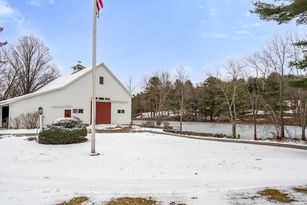 440 Conant Road Weston, MA 02493 - Photo 2 of 15 a view of a covered with snow in the yard