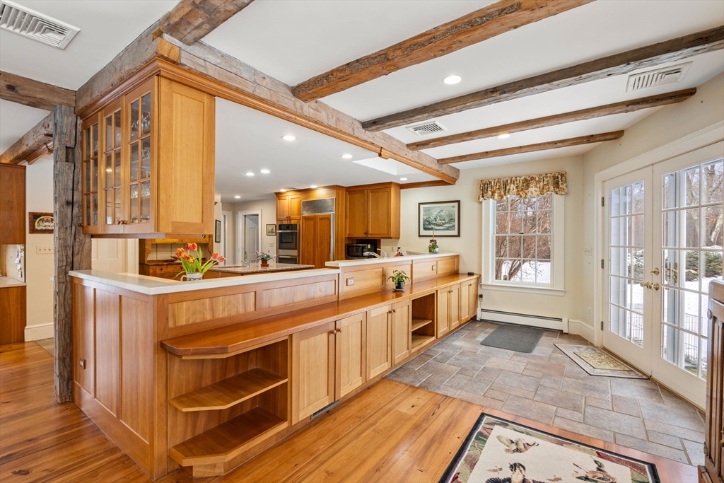 440 Conant Road Weston, MA 02493 - Photo 5 of 15 a large white kitchen with a large window