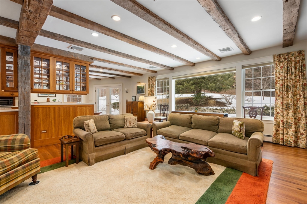 440 Conant Road Weston, MA 02493 - Photo 7 of 15 a living room with furniture and a large window