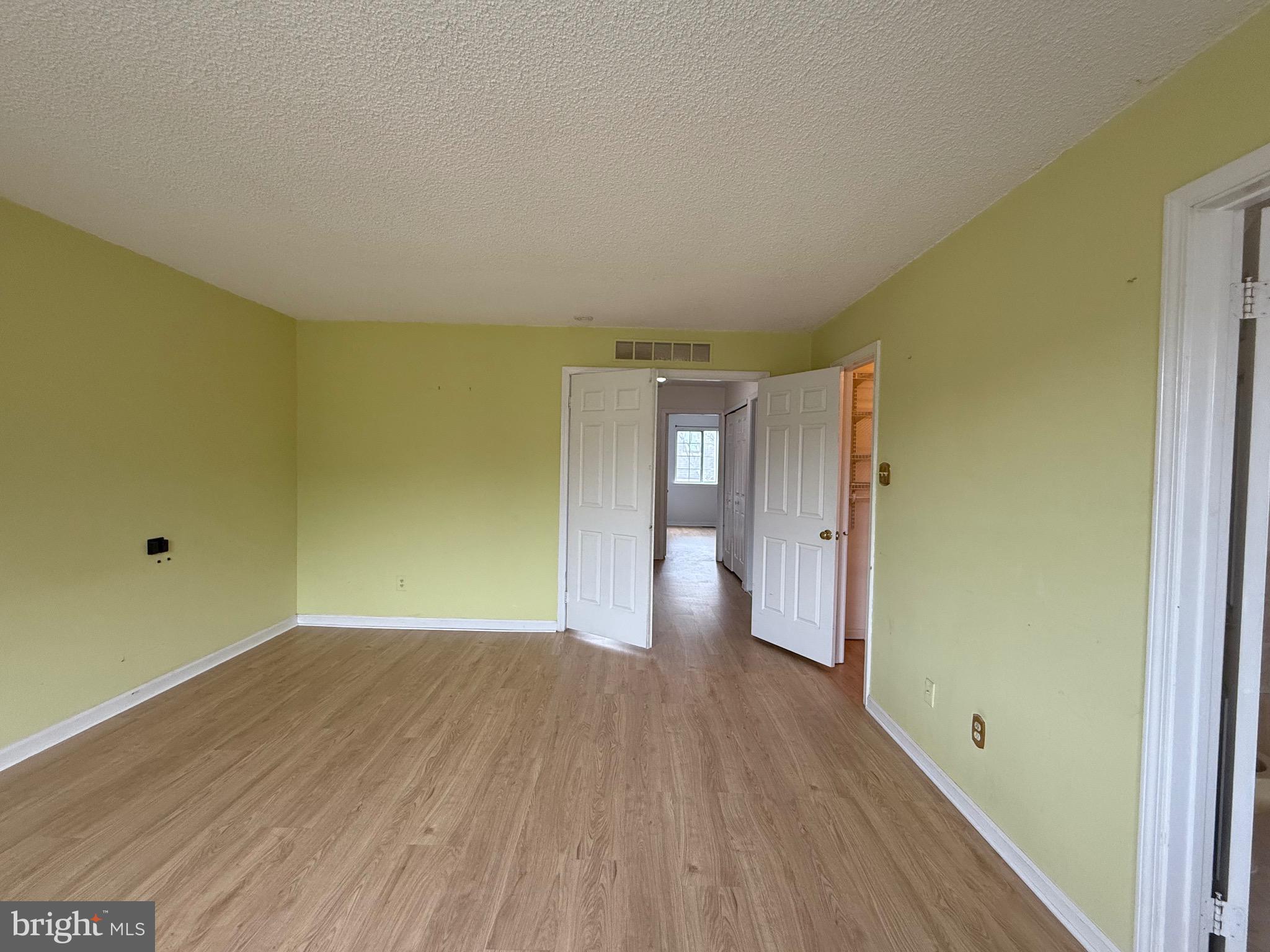 52 Constitution Court Chesterbrook, PA 19087 - Photo 17 of 35 a view of a big room with wooden floor and windows