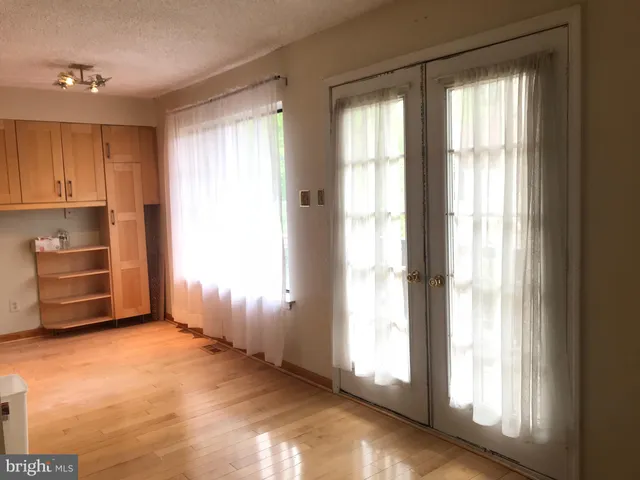 a view of a room with racks on the wall