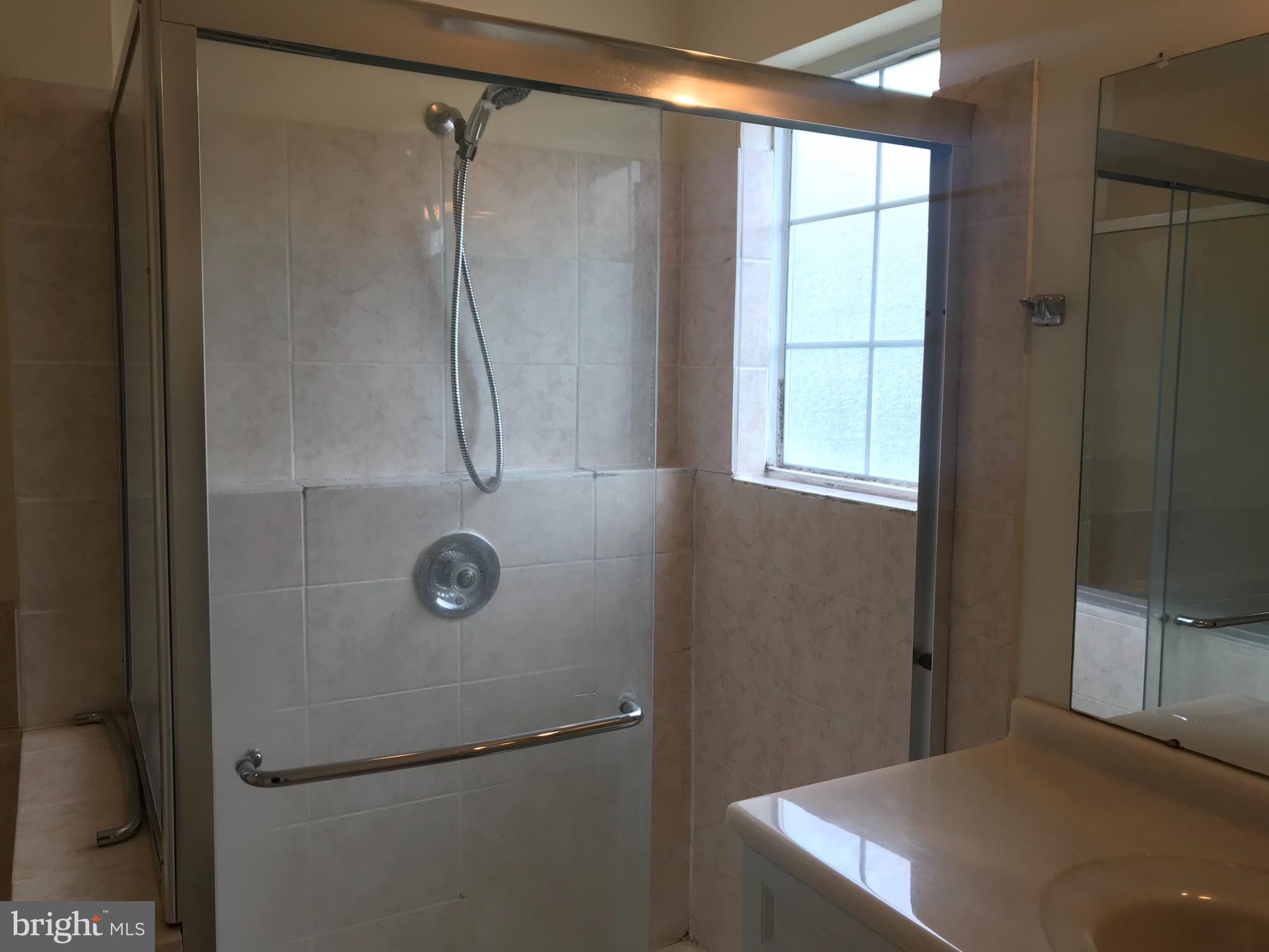 52 Constitution Court Chesterbrook, PA 19087 - Photo 3 of 35 a bathroom with a shower