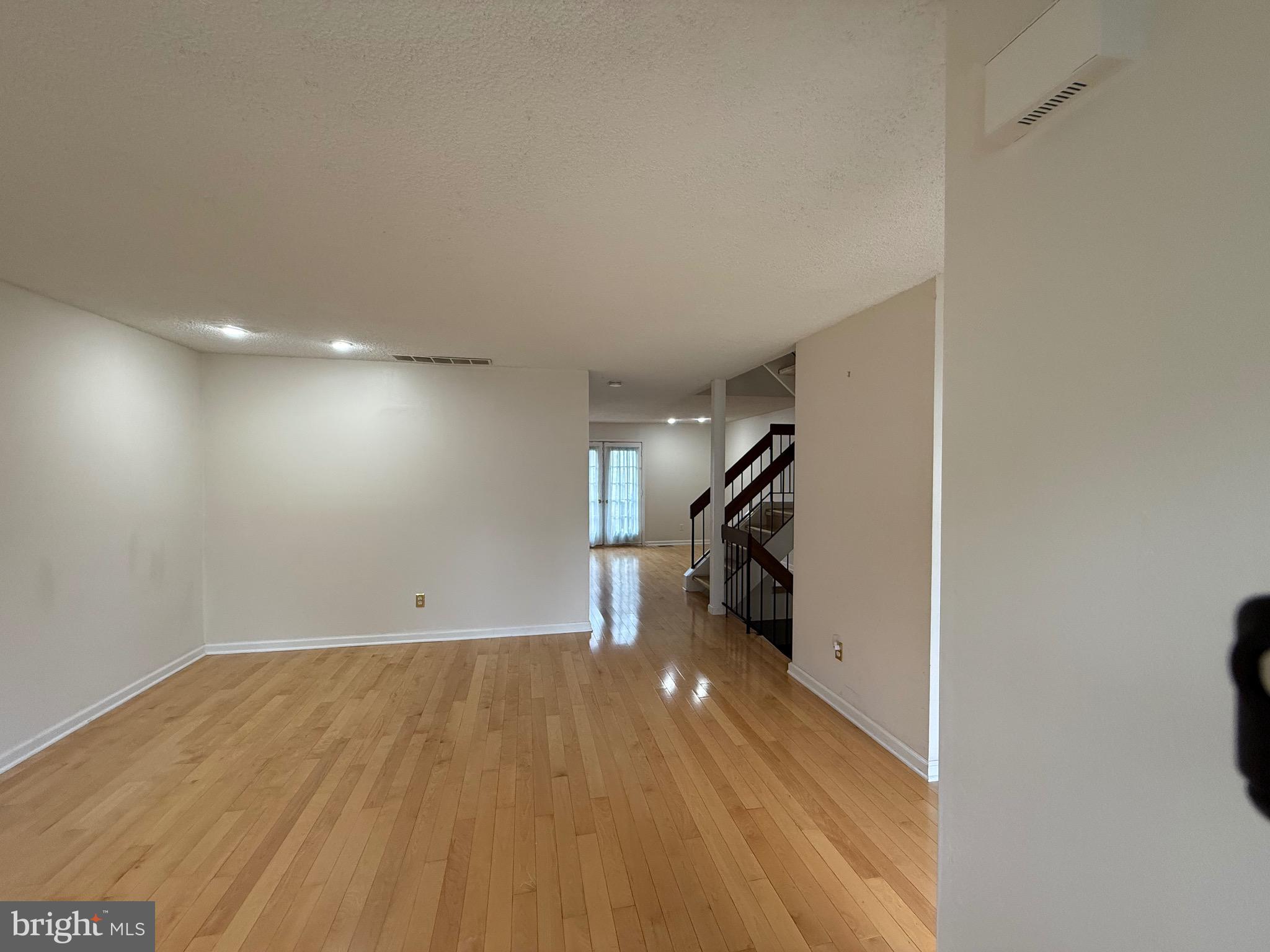 52 Constitution Court Chesterbrook, PA 19087 - Photo 33 of 35 a view of empty room with wooden floor