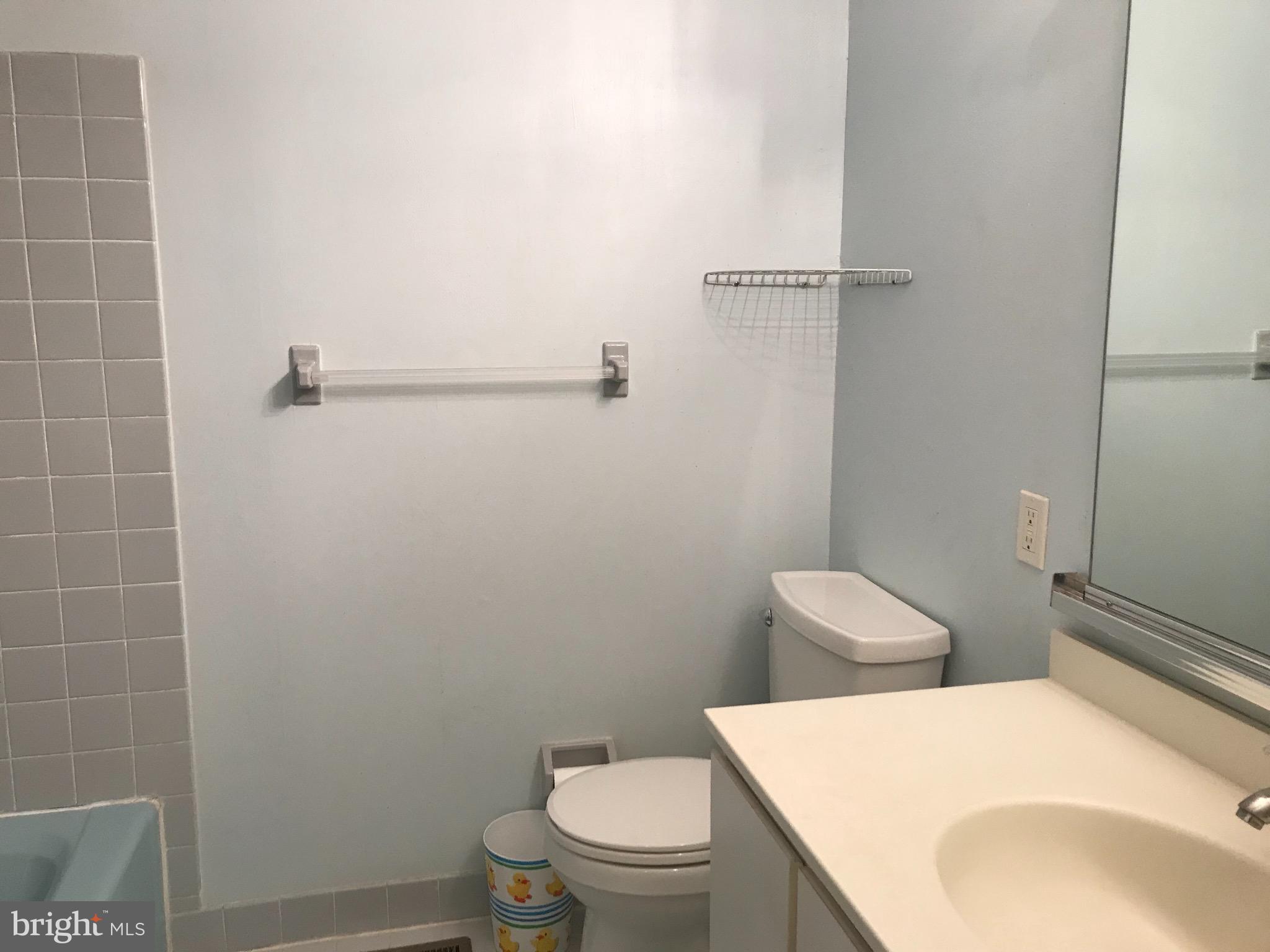 52 Constitution Court Chesterbrook, PA 19087 - Photo 6 of 35 a white toilet sitting next to a bathroom sink