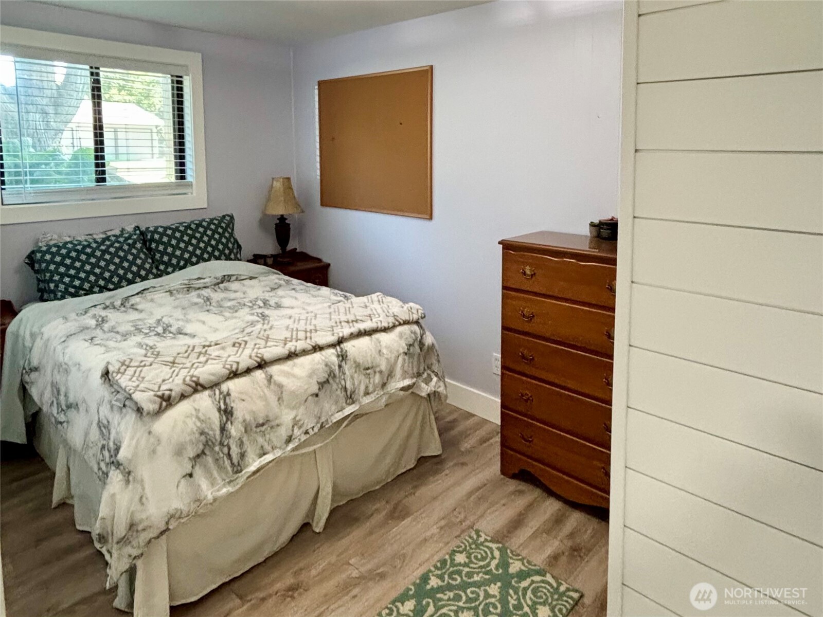 715 Liberty Place Walla Walla, WA 99362 - Photo 21 of 32 a bedroom with a bed and a window