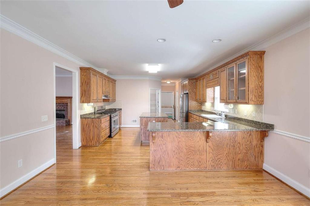 1799 Eliza Doster Road Monroe, GA 30656 - Photo 12 of 60 a living room with fireplace furniture and a large window