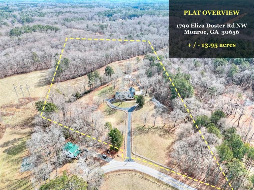 1799 Eliza Doster Road Monroe, GA 30656 - Photo 3 of 60 a sign that is on the side of the road